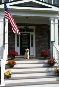 Luna on his front porch