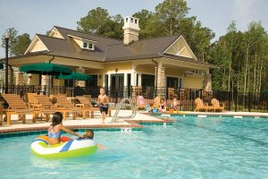 Boy Running To Inner Tube